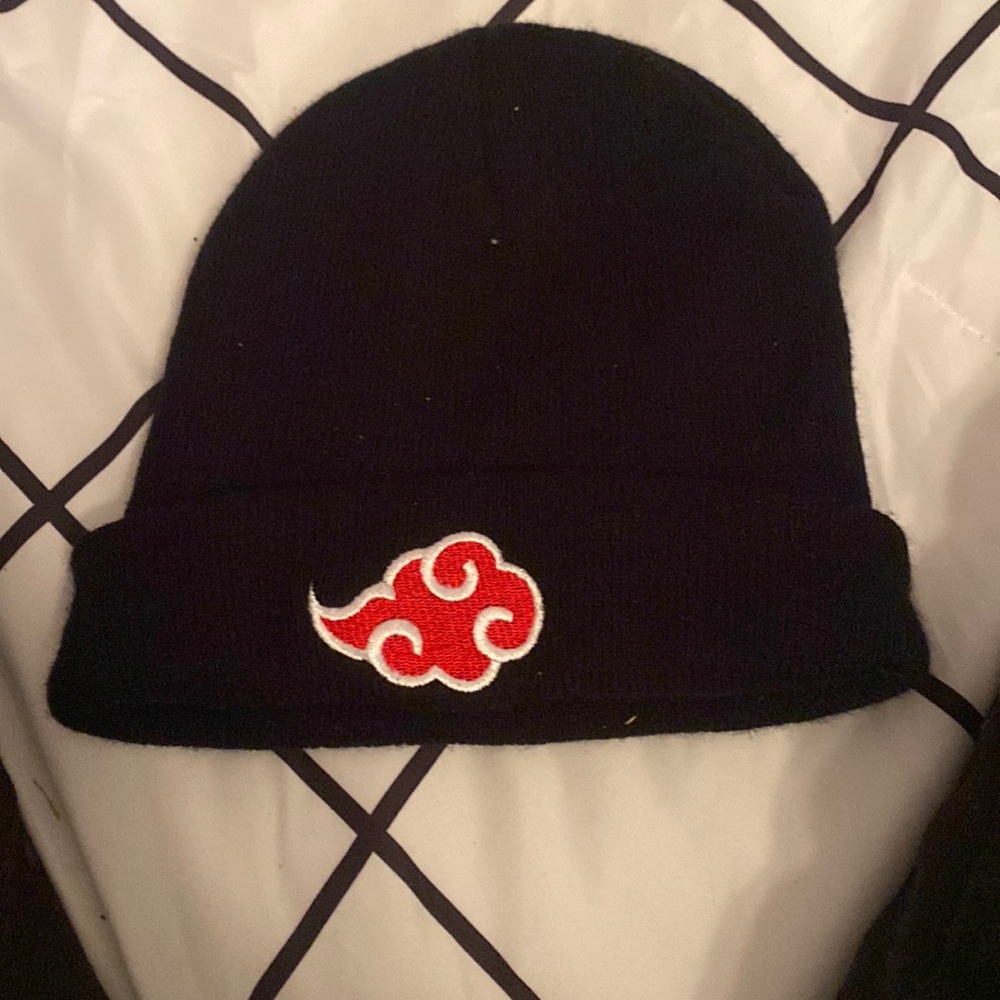 Black, white, and red beanie